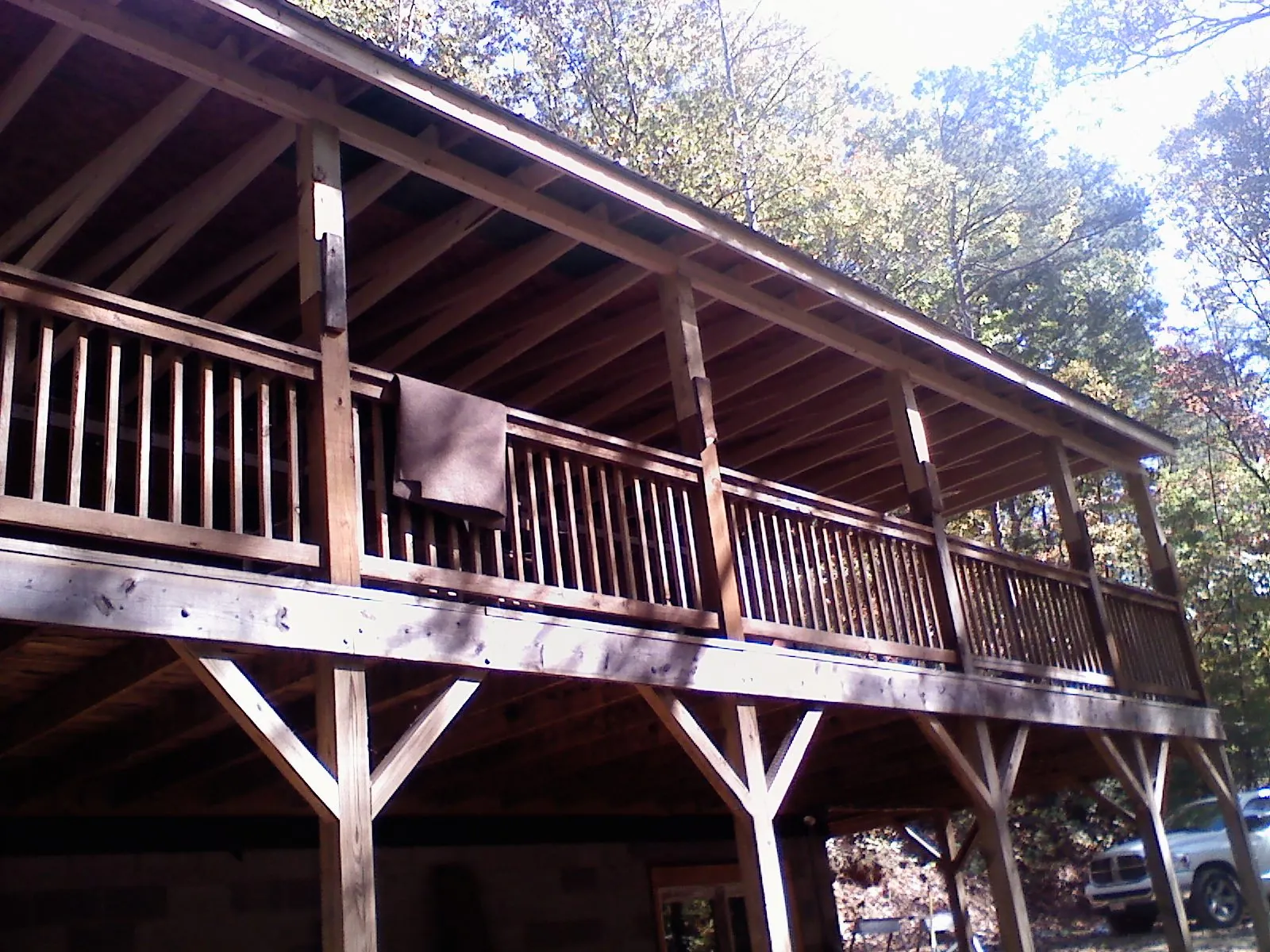 Timber framing under a new elevated porch and deck — Roof Leak Repair in Montour by Roofing Brothers